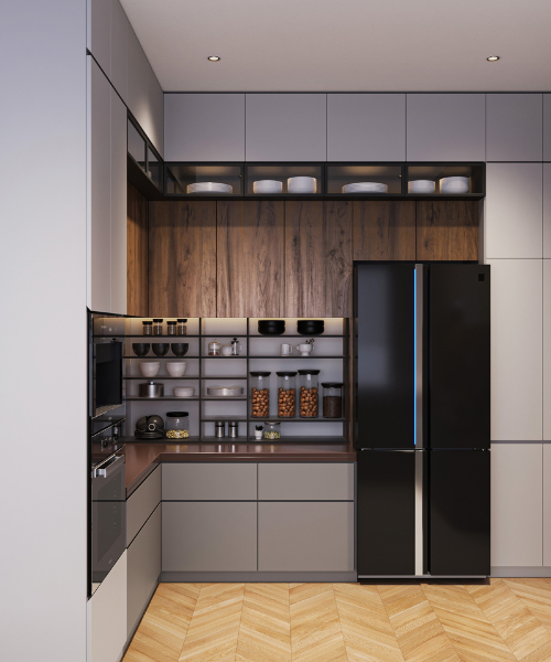 A black refrigerator freezer sitting inside of a kitchen