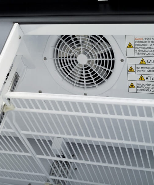 A close up of a ventilator in a building